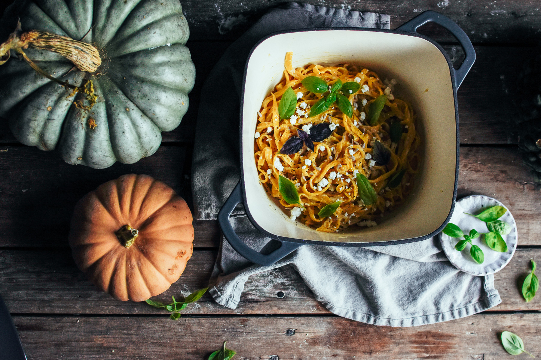 pumpkin pasta with alfredo sauce, fresh basil, and goat cheese