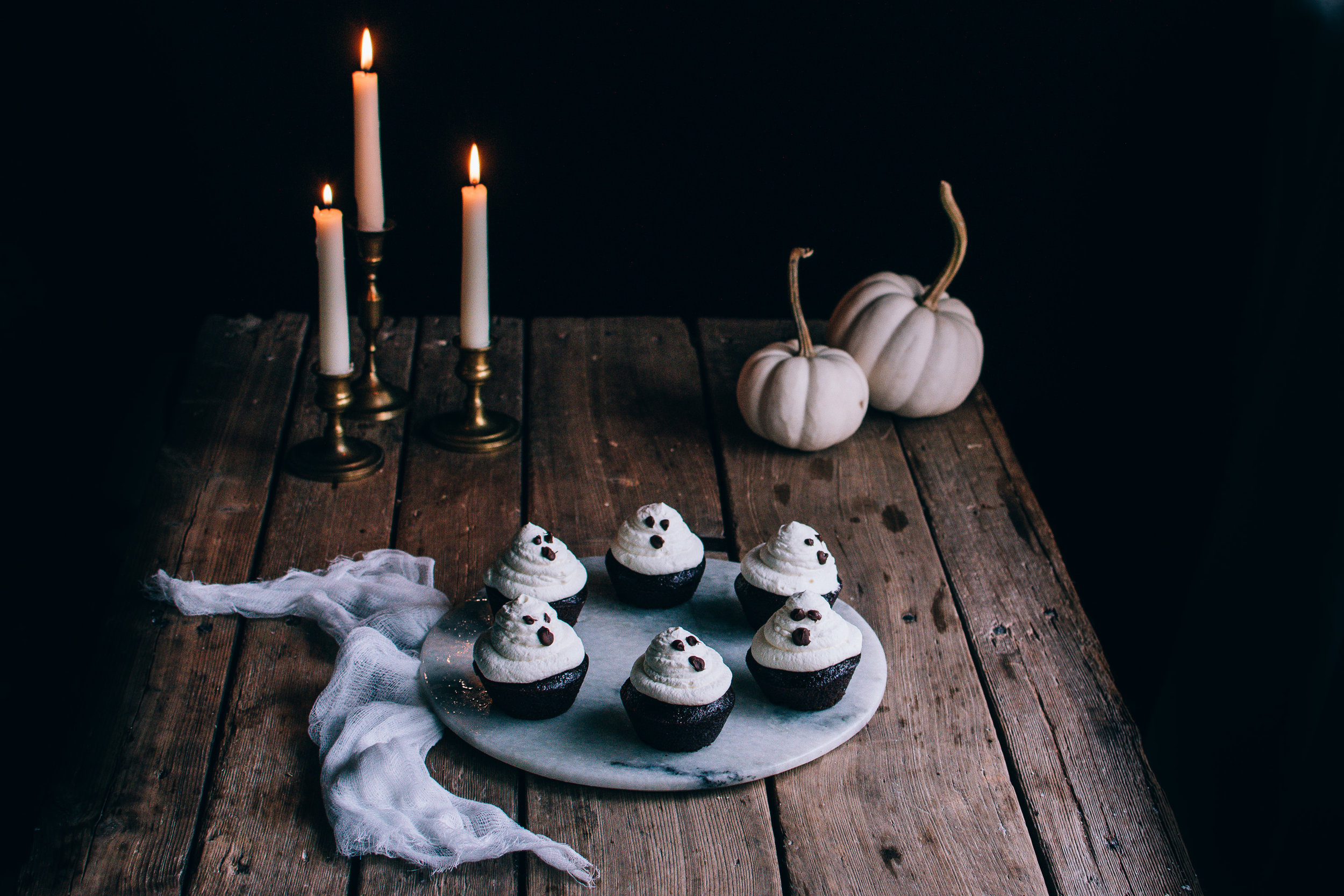 whipped cream (frozen) and chocolate ghost cupcakes - halloween edition
