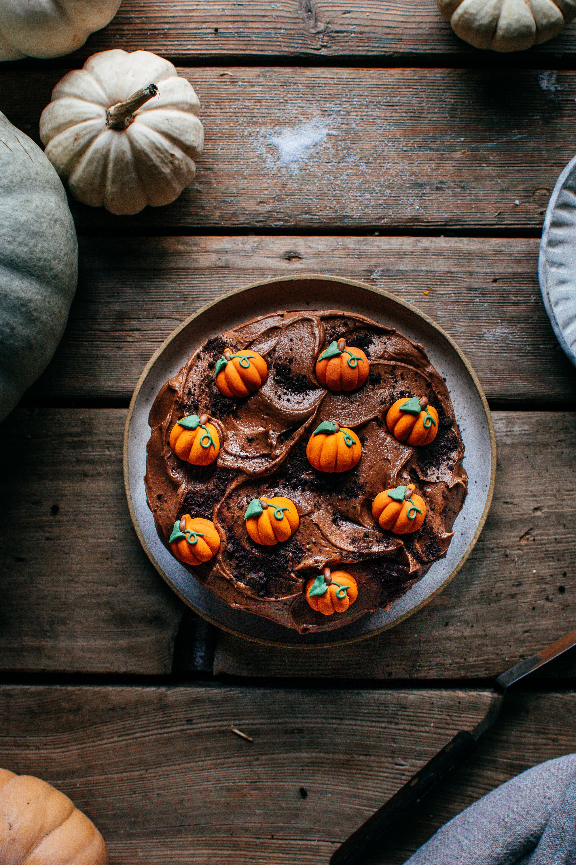 small pumpkin cake with chocolate frosting (aka: a pumpkin patch cake)